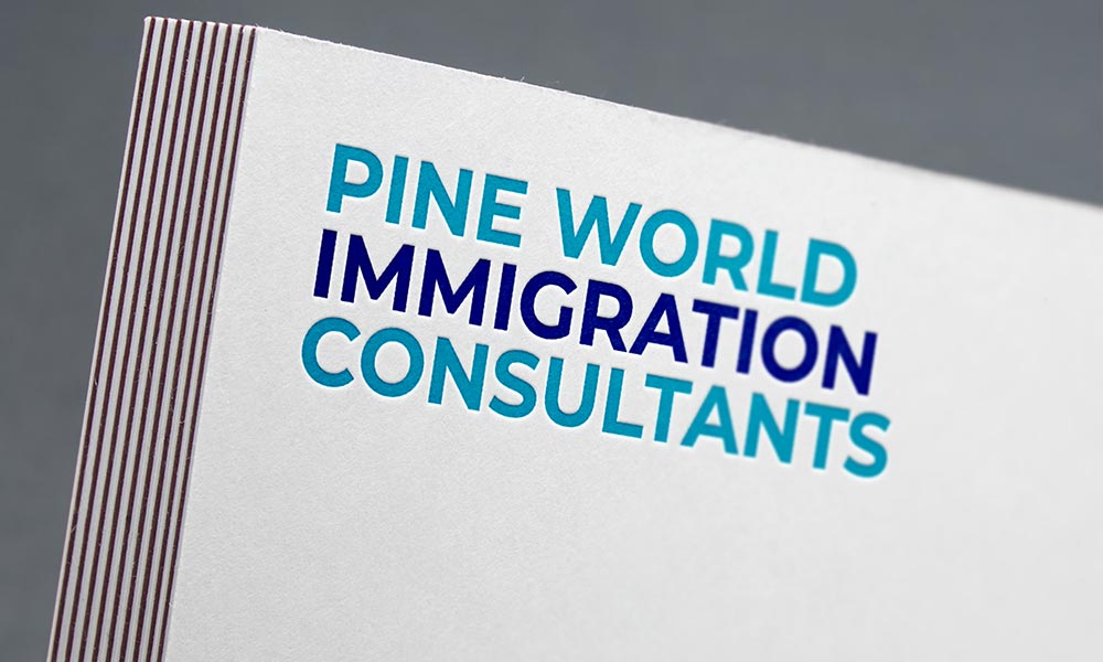 pine world immigration consultants logo